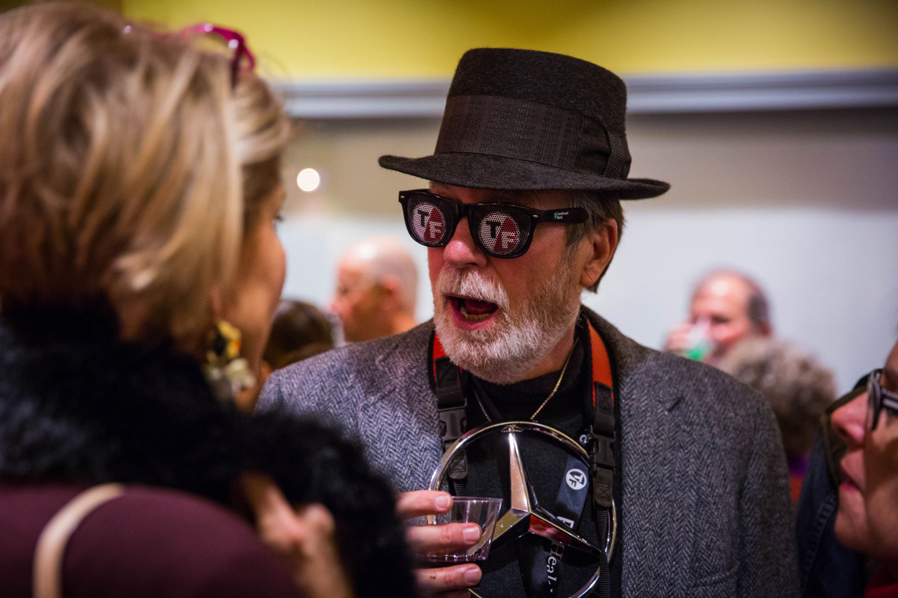 A man with T/F glasses